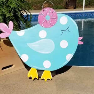 Spring bird door hanger