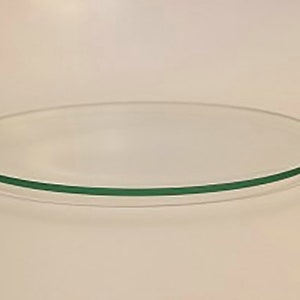 May include: A clear glass plate with a green rim.