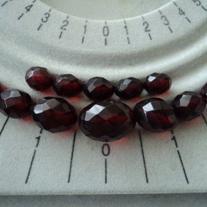 Art Deco faceted Cherry Amber Bakelite beads
