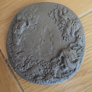 Persian story terracotta medallion