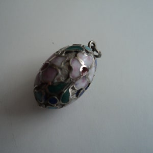 Vintage silver stones egg pendant