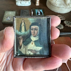 Colgante devocional colonial español Óleo sobre cobre de acero Pintura de María de Jesús de Ágreda Visión de la Inmaculada Concepción del siglo XVII