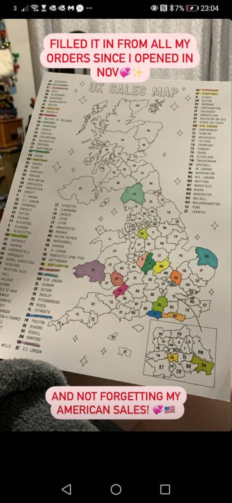 May include: A map of the United Kingdom with each region colored in. The map is titled "UK Sales Map". The caption below the map reads "And not forgetting my American sales!" with a small American flag.