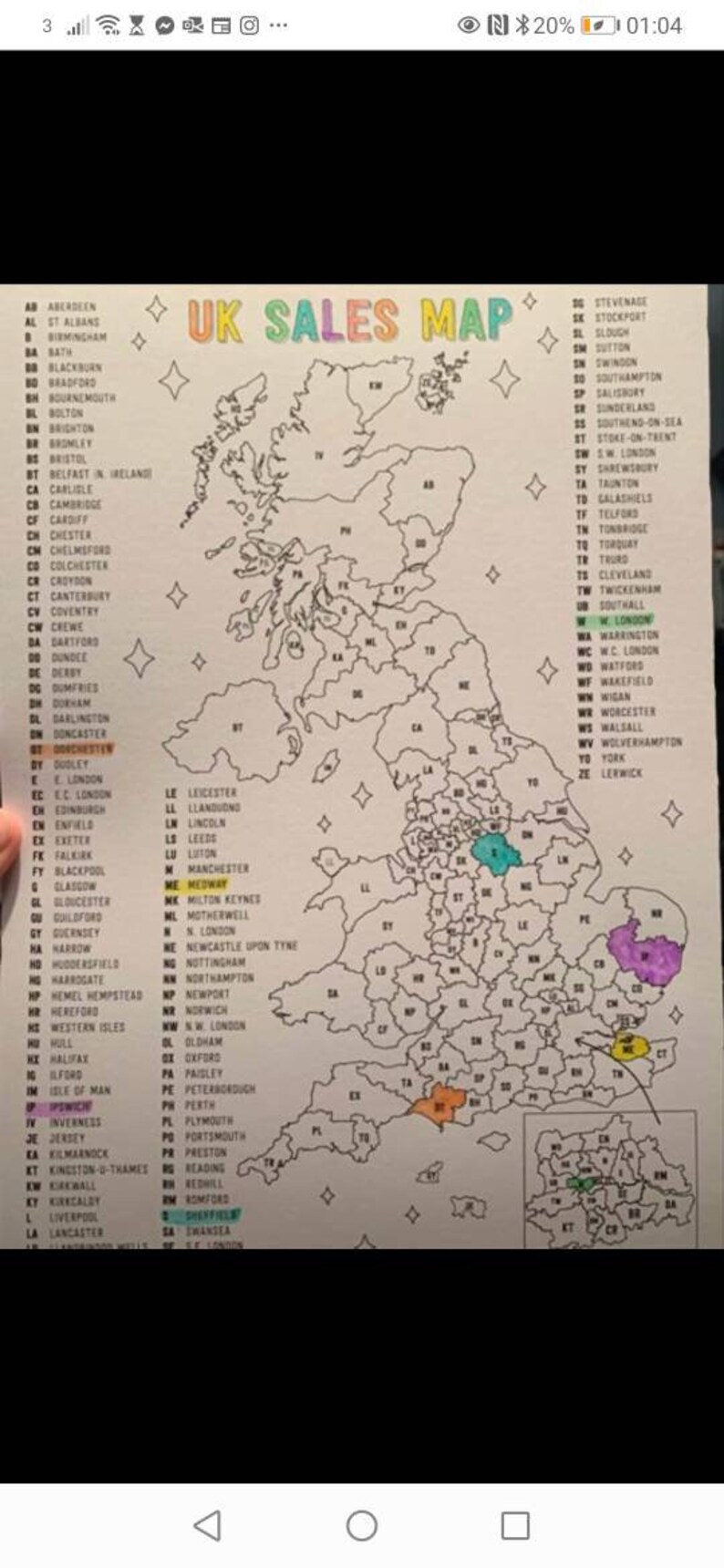 May include: A map of the United Kingdom with different colored regions, each labeled with a city name and a two-letter abbreviation. The map is titled "UK Sales Map".