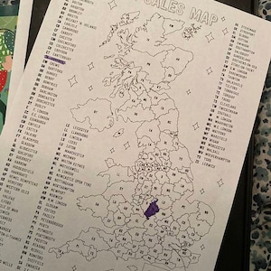 May include: A black and white map of the United Kingdom with each region labeled with a two-letter abbreviation. The region of Shropshire is highlighted in purple.