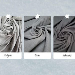 May include: Three fabric swatches in different shades of gray: light gray, gray, and black. The fabric is a soft, crinkled gauze.