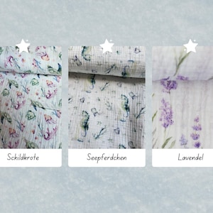 May include: Three fabric swatches with different patterns. The first swatch features a white background with a watercolor design of sea turtles, seahorses, and coral. The second swatch features a white background with a watercolor design of seahorses. The third swatch features a white background with a watercolor design of lavender flowers. The swatches are labeled "Schildkrote", "Seepferdchen", and "Lavendel".