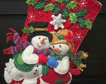 Handgestikte kerstsok Snowflake Snuggle Bucilla