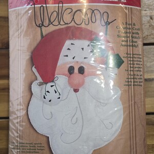 Dimensions Feltworks Santa Buddy Welcome  wall hanging kit.