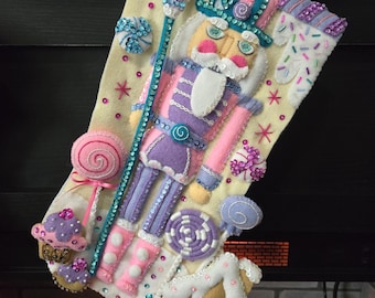 Handgestikte kerstsok Notenkraker zoet. BUCILLA