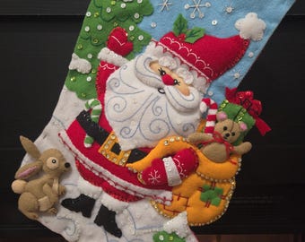 Handgestikte kerstsok Retro kerstman 89740E. BUCILLA