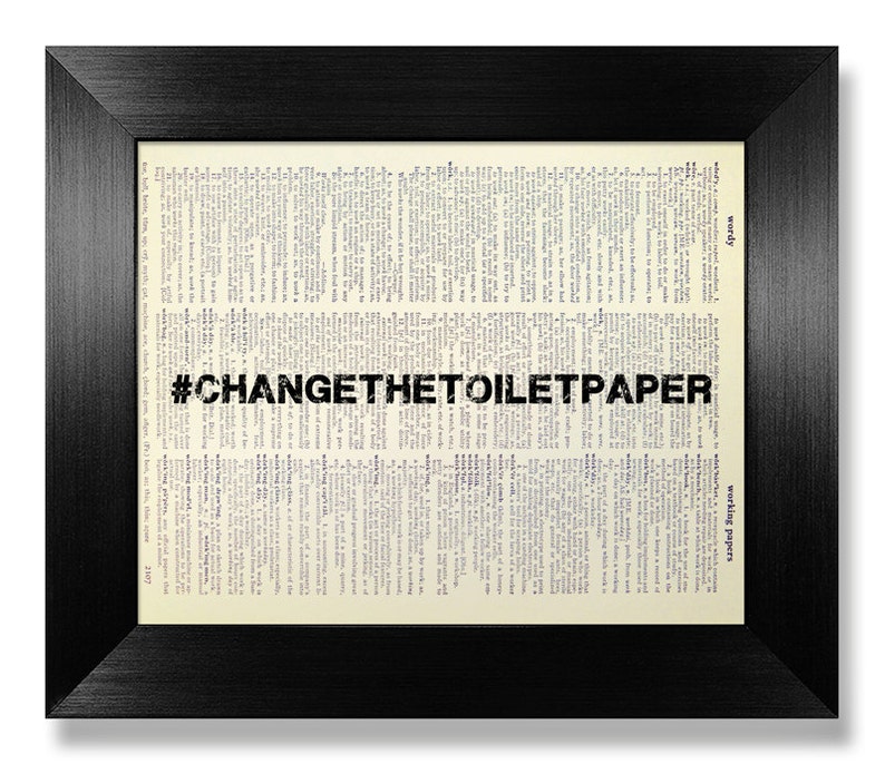 May include: A black framed print with a vintage dictionary page background. The text "#CHANGETHETOILETPAPER" is printed in black across the page.