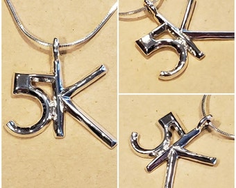 5K Runners symbol, made in Sterling Silver with chain.