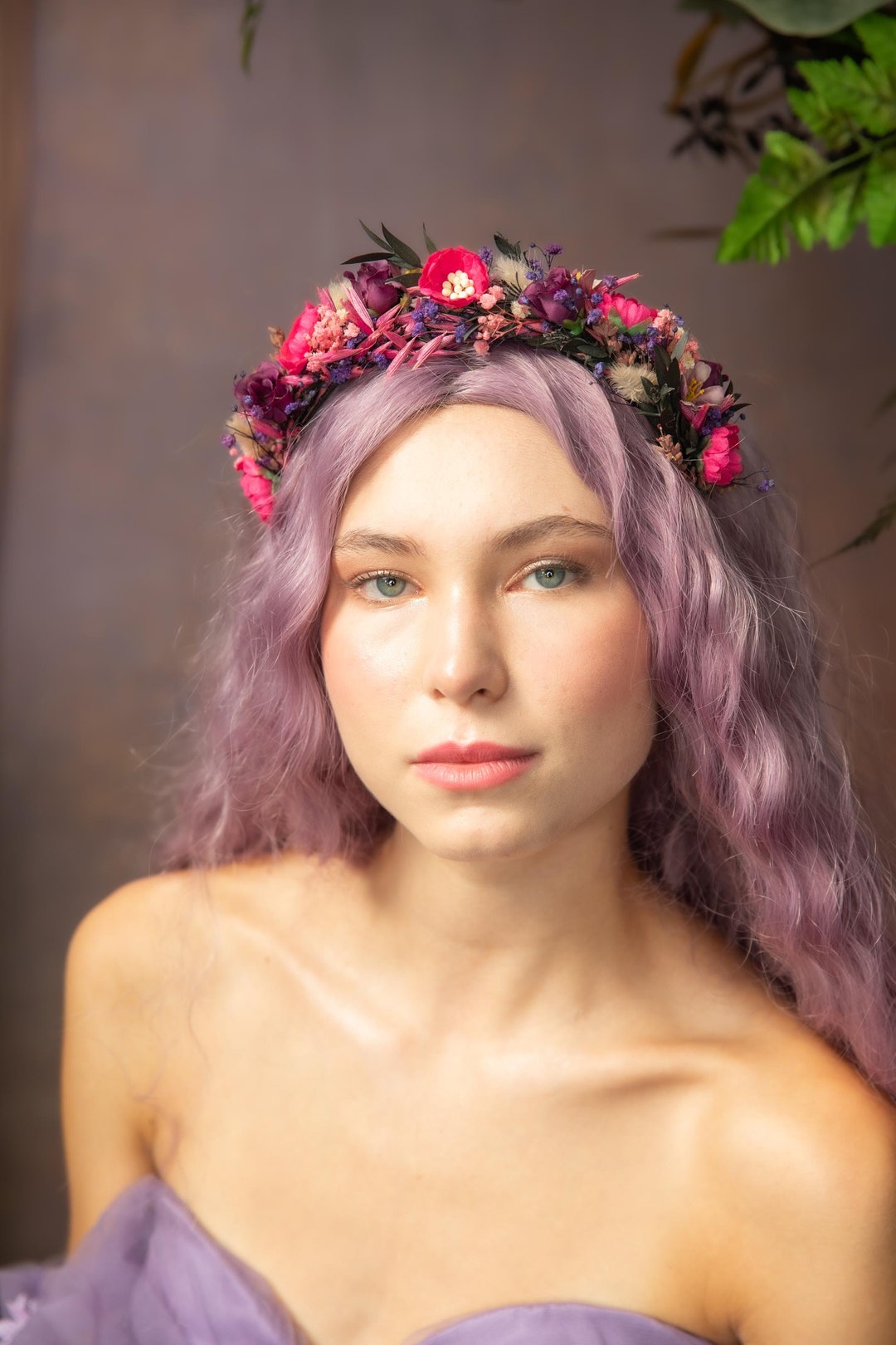 Purple flower with
 feathers headband