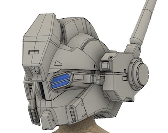 May include: A detailed 3D model of a robot head with a gray and blue color scheme. The head has a large, rounded helmet with a visor and a smaller, rectangular helmet on top. The head is mounted on a stand.