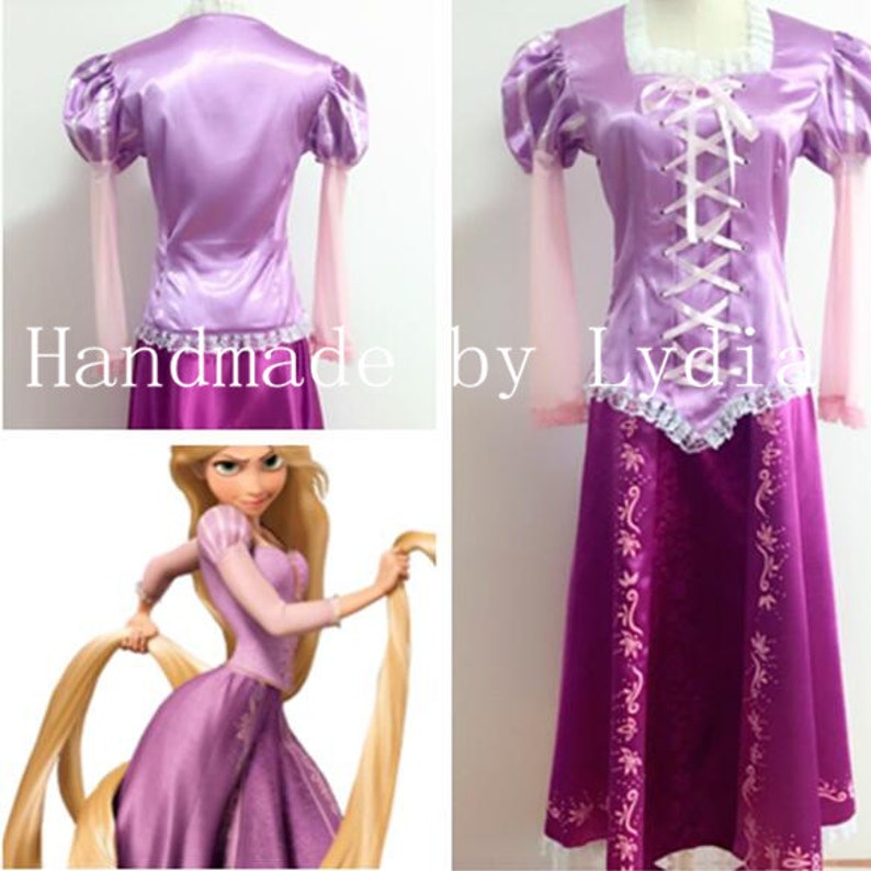May include: A purple and pink princess costume with a lace bodice and a long skirt. The skirt has a floral pattern and the bodice has a lace trim. The costume is handmade.