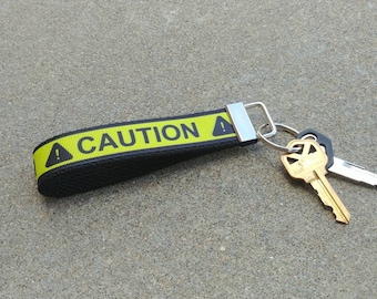 Caution Key Fob Wristlet! Fabric Key Chain. Warning New Driver. Danger! Student Driver. Gift for Him. Quarantine Gifts. Social Distancing