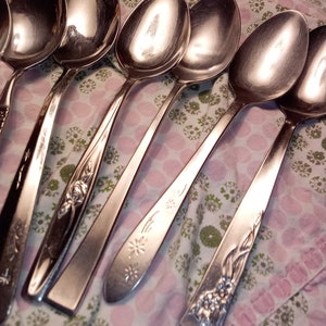 May include: A rustic wooden sign with the text "Welcome to our home" in a handwritten style. The sign features a distressed finish and a simple, inviting design, perfect for entryway decor.