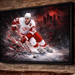 May include: A framed canvas print featuring a hockey player in a red and white uniform, number 91, skating with a hockey stick. The background has a cityscape silhouette and abstract red and black paint splatters.
