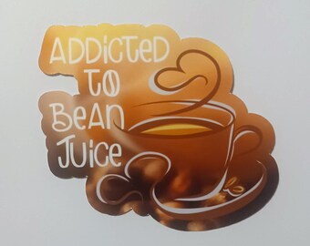 May include: A brown and white sticker with the text "Addicted to Bean Juice" and a cartoon image of a coffee cup with steam rising from it.