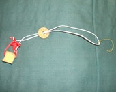 Teapot dripcatcher with Chinese coin charm