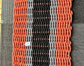Oranje met grijze en zwarte deurmatten 29x19