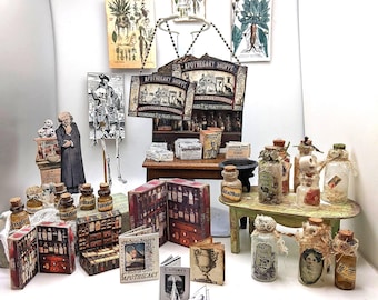 May include: A miniature apothecary shoppe display featuring a wooden shelf, various glass bottles with cork stoppers, small printed books, and botanical illustrations. The set includes a hanging sign labeled Apothecary Shoppe and a figure of a person.