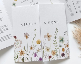 May include: A wedding invitation with a floral design. The invitation includes the names Ashley and Ross, the date and time of the ceremony, and a timeline of the day's events.