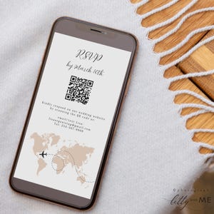 May include: A smartphone displaying a wedding RSVP card with a QR code, a world map with a plane, and the text "RSVP by March 10th".