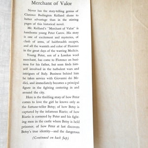 May include: Open book page with the title "Merchant of Valor" and descriptive text. The text describes the story of Peter Carew in Florence, Italy, and mentions the "Book Club Edition" at the bottom of the page.