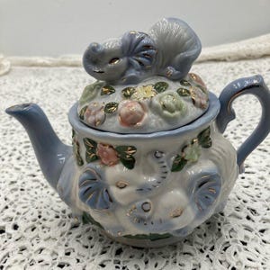 Vintage Hand-Painted Elephant Teapot: Whimsical Floral Design Two pieces Good Luck!