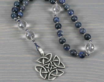 Anglican rosary in dumortierite and crystal quartz with an antiqued pewter square Celtic cross on hand-knotted cord