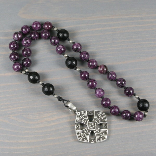 Anglican rosary in violet jade and matte black onyx with an antiqued pewter diamond-shaped Celtic cross on hand-knotted cord