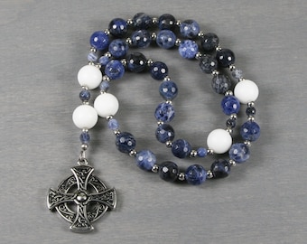 Anglican rosary in faceted sodalite, matte white jade, and a round Celtic cross