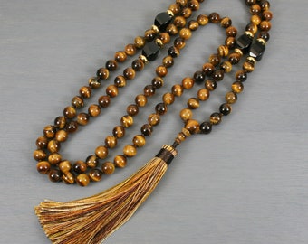 Tiger eye and black onyx hand knotted mala in the Zen style with tassel