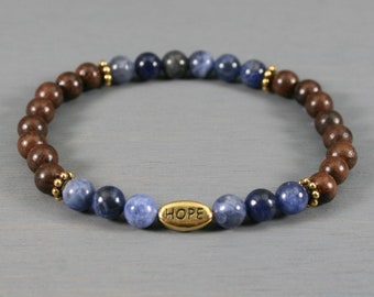 CLEARANCE - Sodalite and wood stretch bracelet with a gold HOPE focal bead