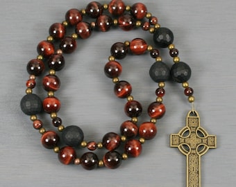 Anglican rosary in red tiger eye and black onyx with a bronze colored Celtic cross