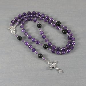 Amethyst, black onyx, and silver rosary in the Roman Catholic style
