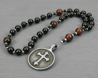 Anglican rosary in obsidian with an antiqued pewter cross in a circle