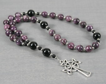Anglican rosary in deep purple lepidolite jade and obsidian with a Celtic trinity knot cross