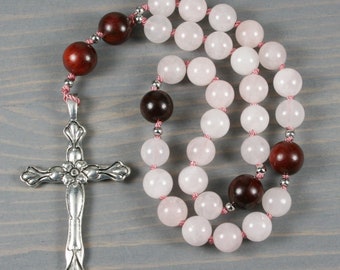 Anglican rosary in rose quartz and red ebonywood with an antiqued pewter cross on hand-knotted cord