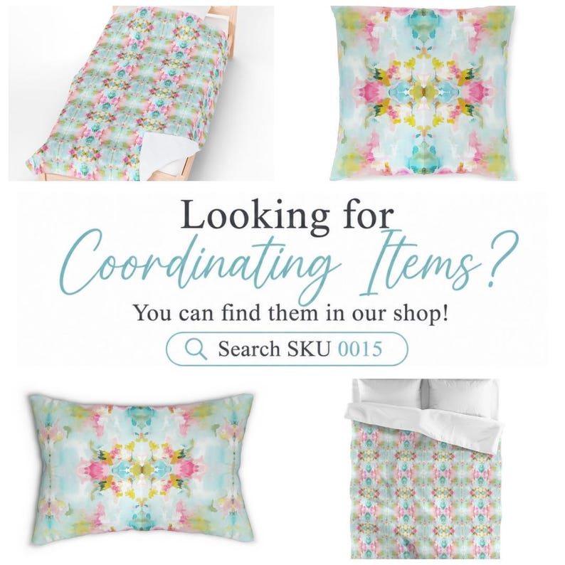 May include: A bedding set and decorative pillows featuring a symmetrical abstract watercolor pattern in shades of light blue, pink, yellow, and green. The image includes text that reads: Looking for Coordinating Items? You can find them in our shop! Search SKU 0015.