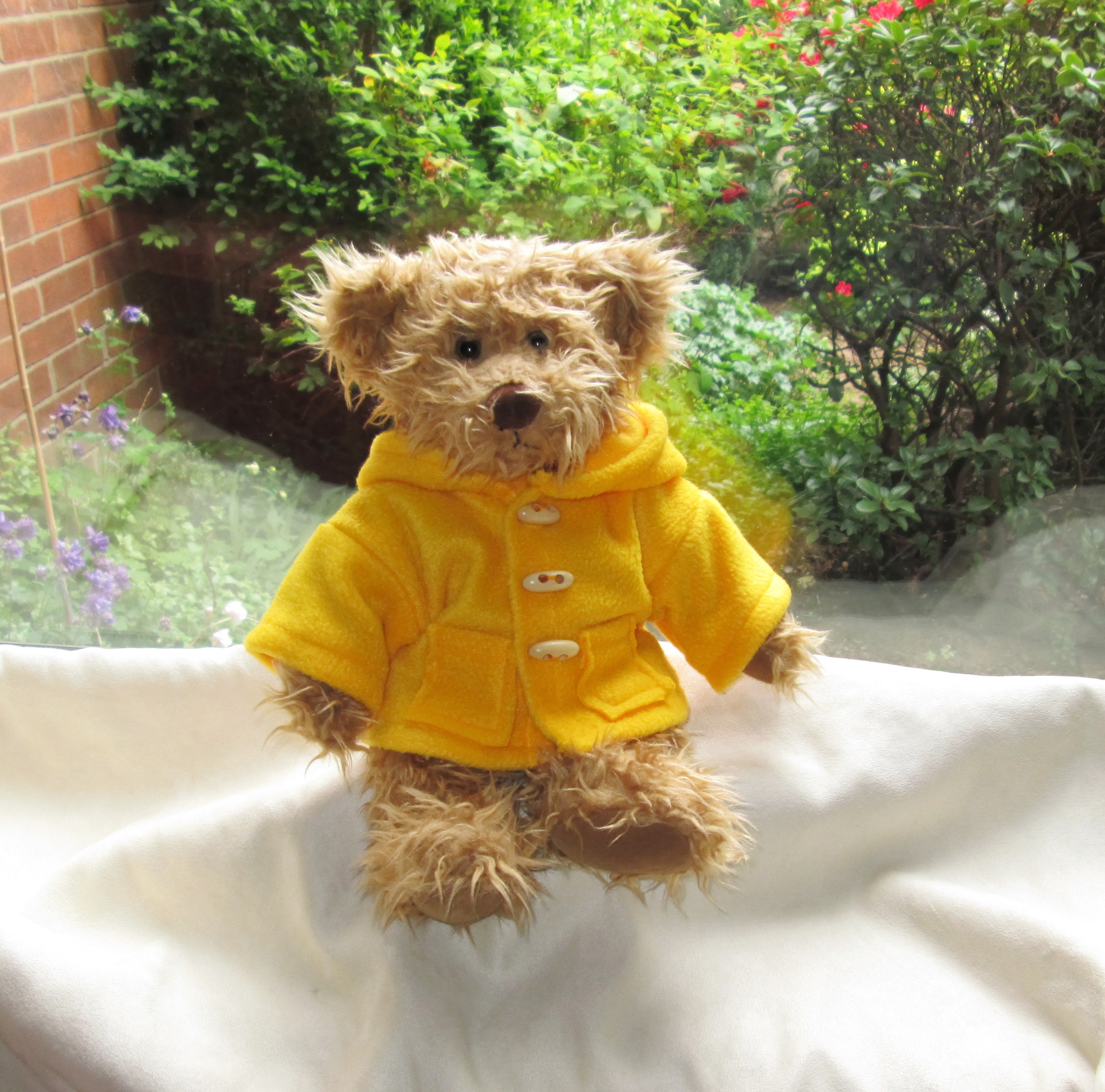 Teddy bear in yellow hotsell raincoat