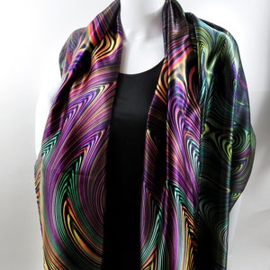 May include: A black satin scarf with a swirling pattern of green, purple, yellow, and orange.