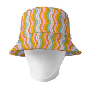 reversible! wavy rainbow bucket hat; cute soft 90s style hat with pink and orange flowers; aesthetic; 90s; 2000s; retro; unisex