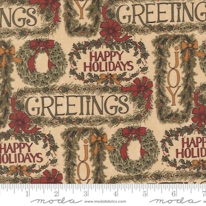May include: Festive fabric featuring a repeating pattern of Christmas wreaths, bows, and the words "GREETINGS", "HAPPY HOLIDAYS", and "JOY". The wreaths are green with red bows, on a beige background.