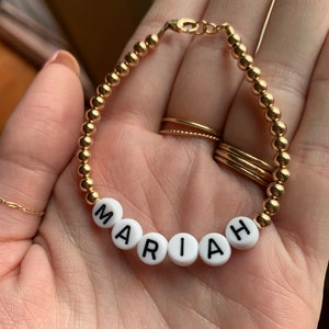 Black letters on white beads WITHOUT 4mm metallics between