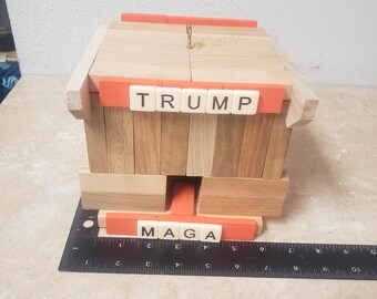 Trump Bird House. Handmade from "Jenga" Style pieces. Orange and Wood. Free Ground Advantage shipping in the USA. ChuckBooks