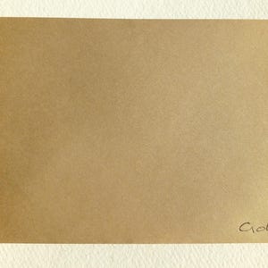 May include: A gold envelope with the word "Gold" written in cursive on the bottom right corner.