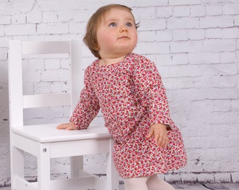 Baby girl dress with long sleeves in white corduroy cotton, printed pink, with motif 